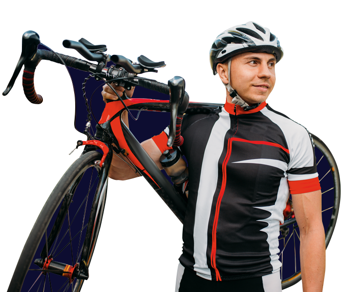 Happy road cyclist holding his red and black road bike